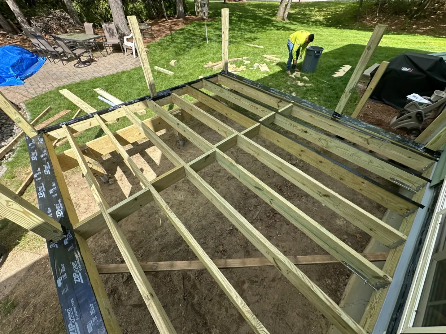 Wooden Framing Surrounded by Grass and Plants